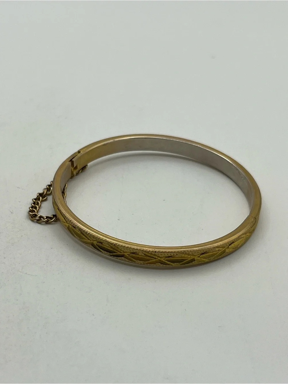 Etched design gold tone small child sized bangle bracelet vintage